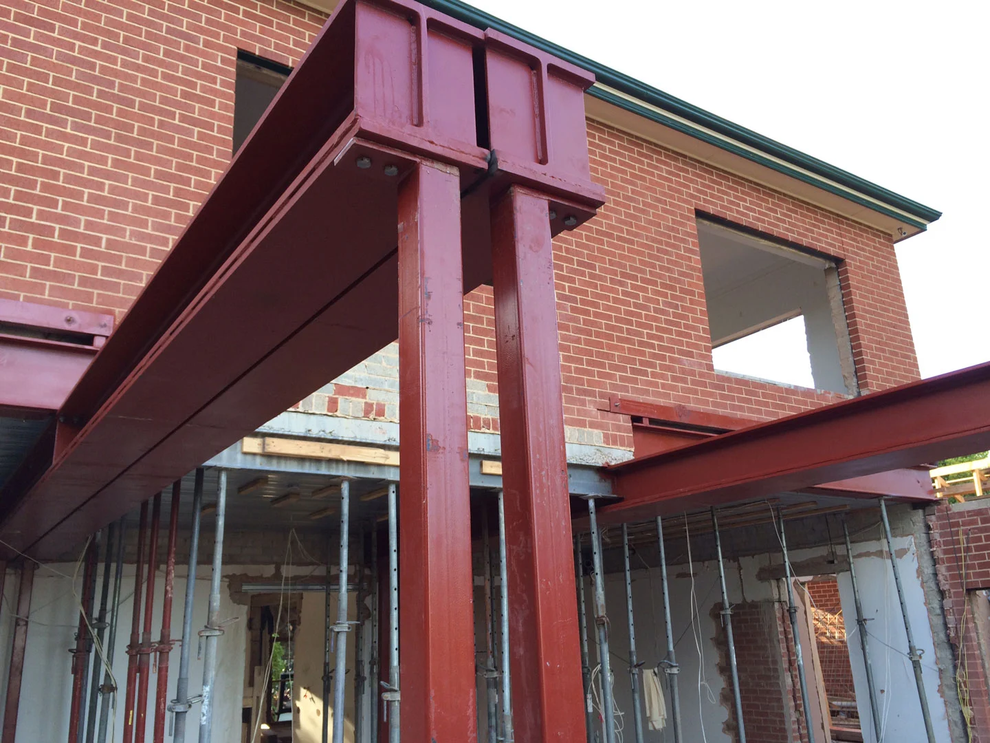 Fabricated steel beam-to-column connection on a house